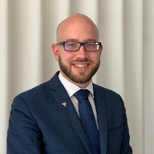 adam-machacek
